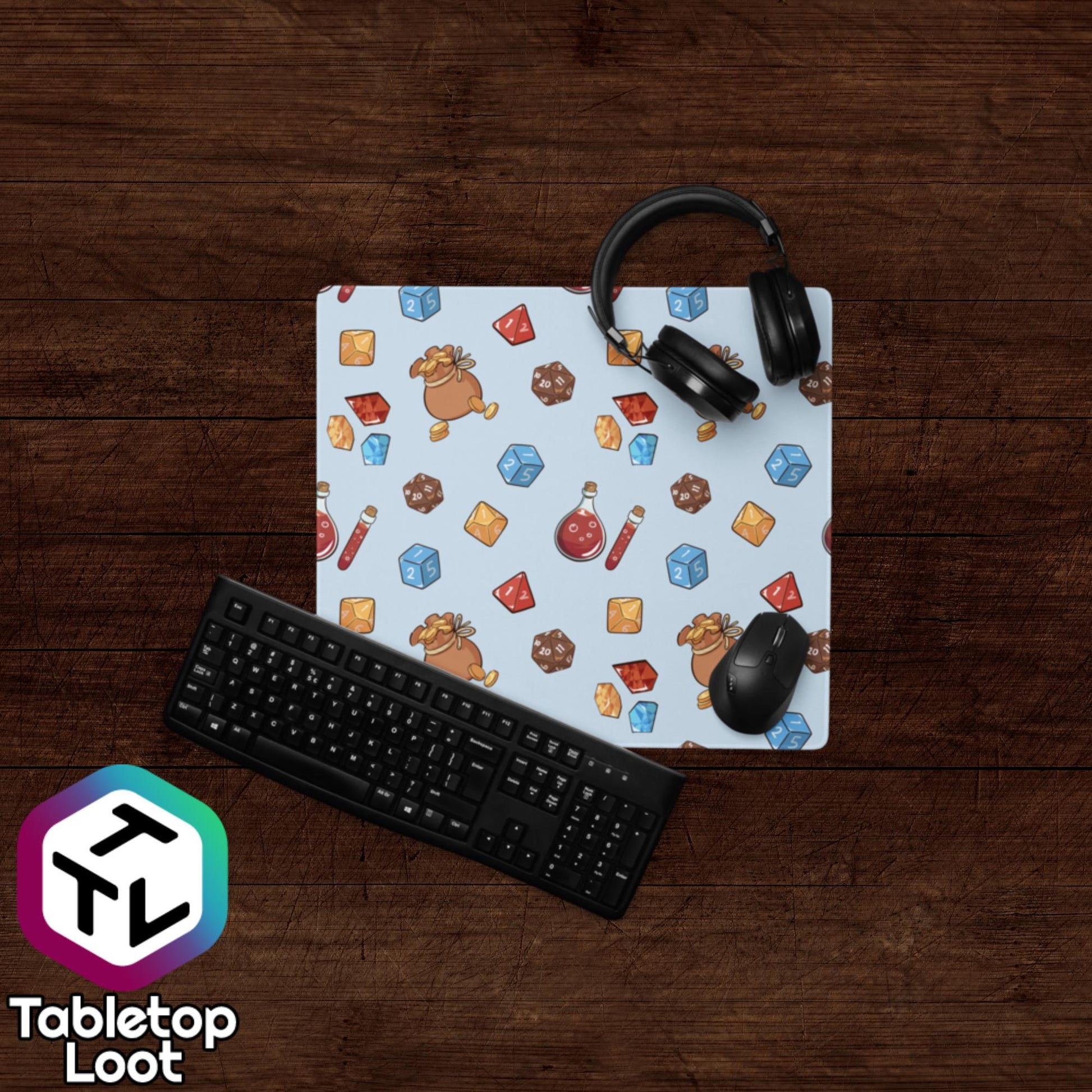 The Loot 18 inch by 16 inch size mouse pad from Tabletop Loot has a pattern of illustrated tabletop trinkets including bags of gold, dice, gems, and potions.