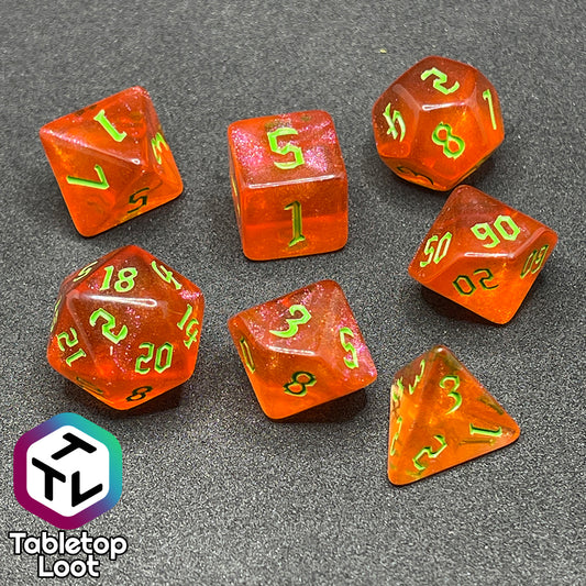 The Cyber Punk'in 7 piece dice set from Tabletop Loot; glittery orange with neon green gothic numbering.