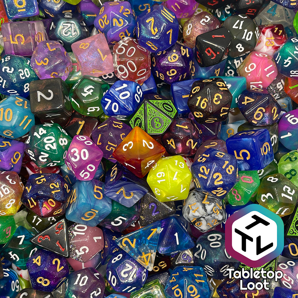 A jumble of dice in many colors with the Tabletop Loot logo.