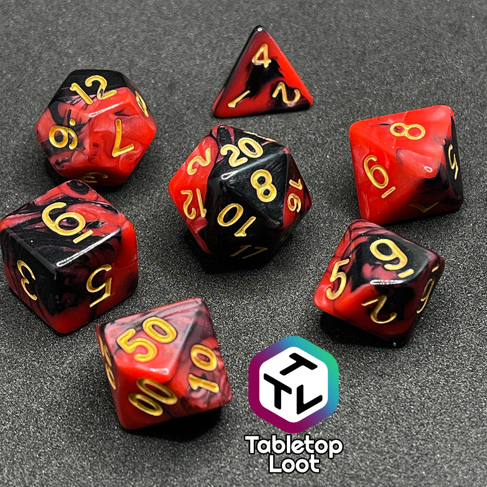 The Forge Embers 7 piece dice set with swirled black and red and gold numbering.
