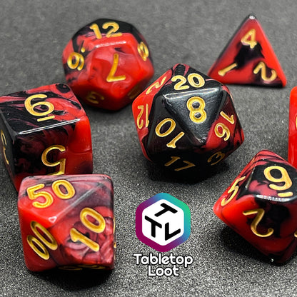 The Forge Embers 7 piece dice set with swirled black and red and gold numbering.