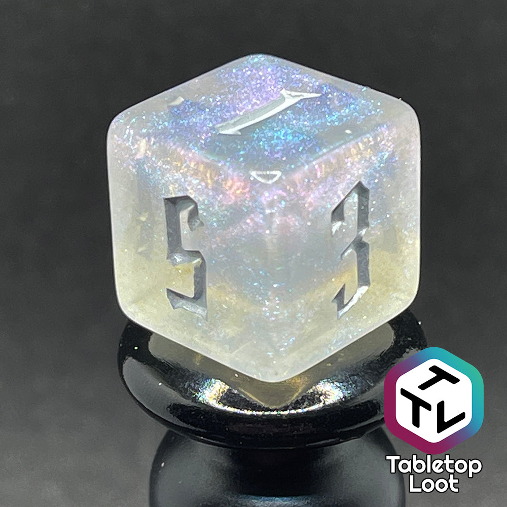 Translucent d6 with iridescent micro-glitter and silver numbers.