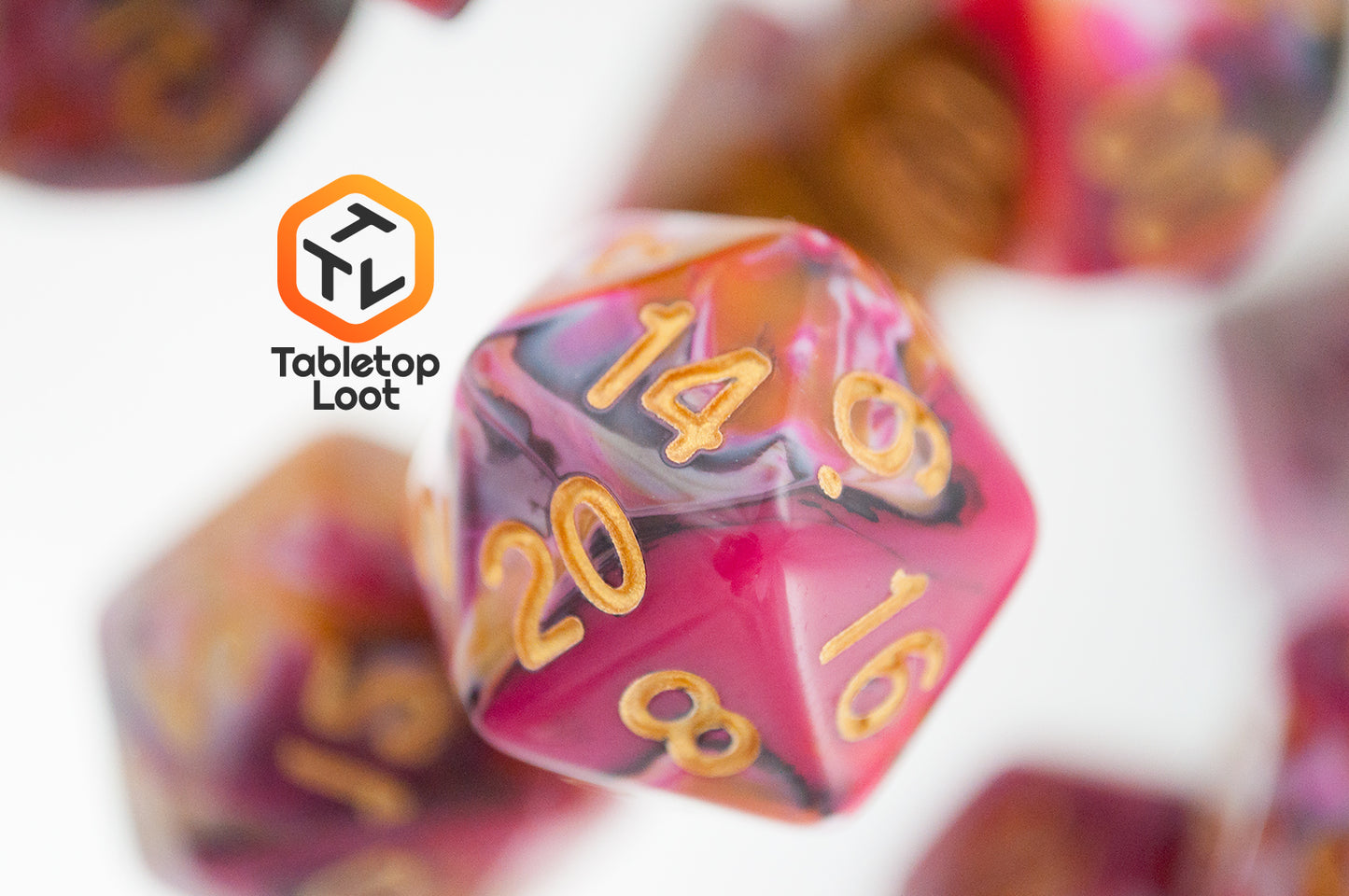 A close up of the D20 from the GoodBerries 7 piece dice set from Tabletop Loot with swirls of red, brown, black, and white and gold numbering.