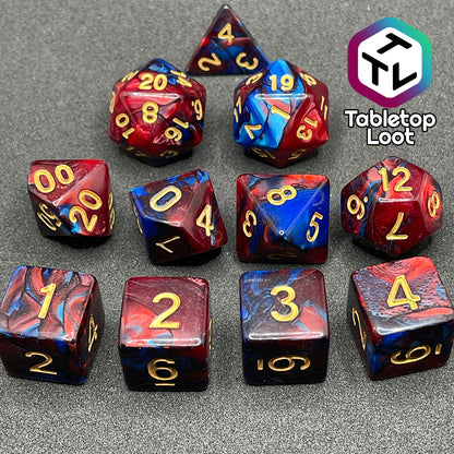 The Metropolis 11 piece dice set from Tabletop Loot with swirls of red and blue and gold numbering.