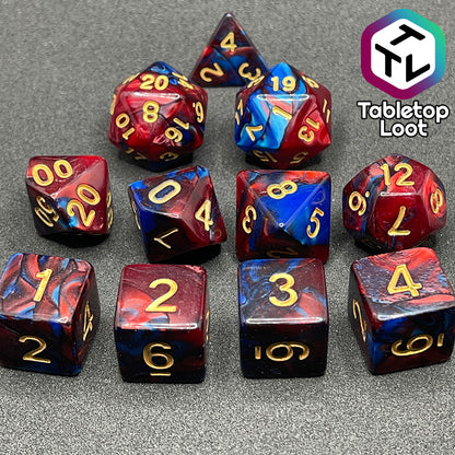 The Metropolis 11 piece dice set from Tabletop Loot with swirls of red and blue and gold numbering.