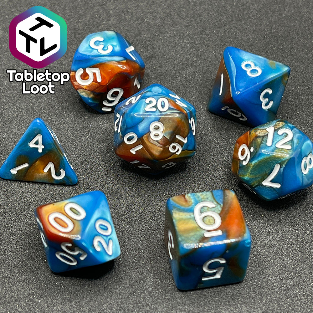 The Patina Copper 7 piece dice set from Tabletop Loot with swirls of pearlescent blue and orange and white numbering.