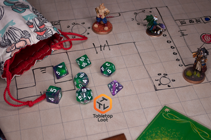 The Witch's Brew 7 piece dice set from Tabletop Loot with purple and green shimmery swirls and white numbering.