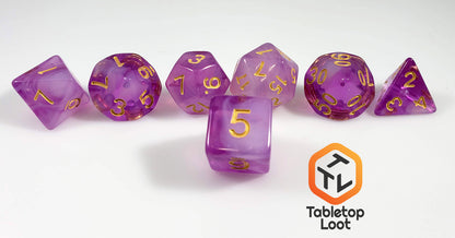 A close up of the D6 from the Amethyst Geode 7 piece dice set from Tabletop Loot with swirls of purple and white resin and gold numbering.