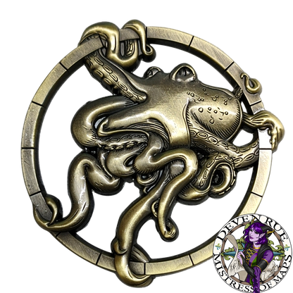 One side of the Octopus token preview by Deven Rue with the details of the image carved into raised surfaces.