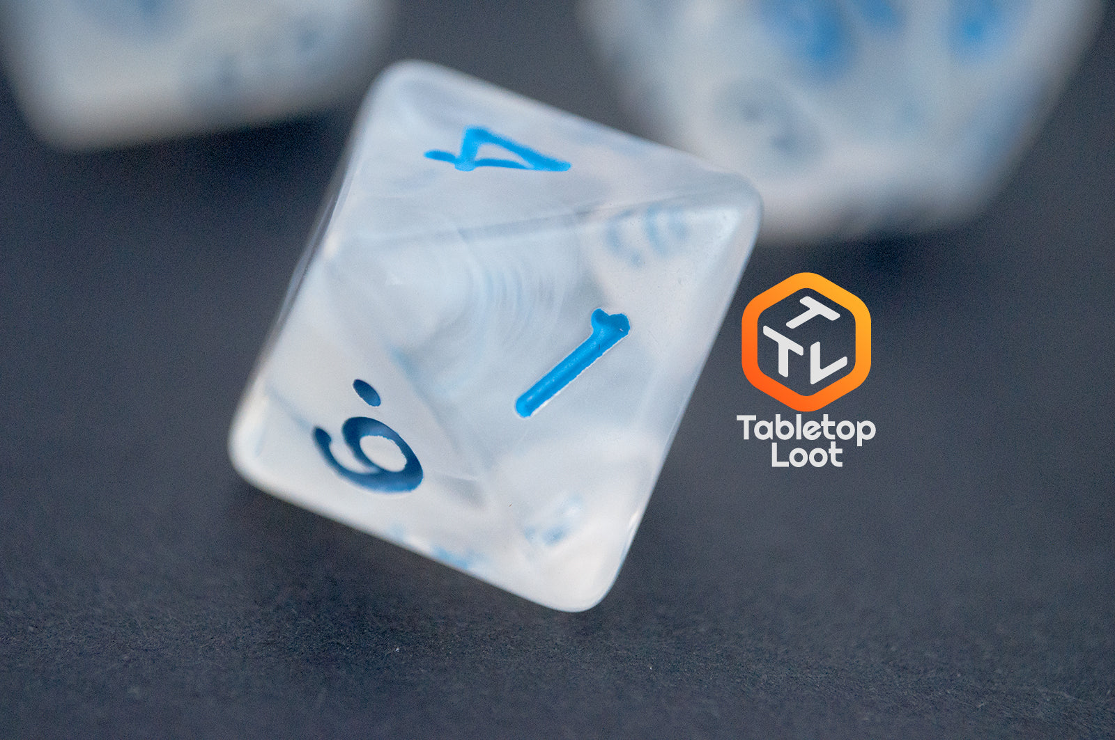 A close up of the D8 from the Dinneshere 7 piece dice set from Tabletop Loot with wispy white swirls and blue numbering.