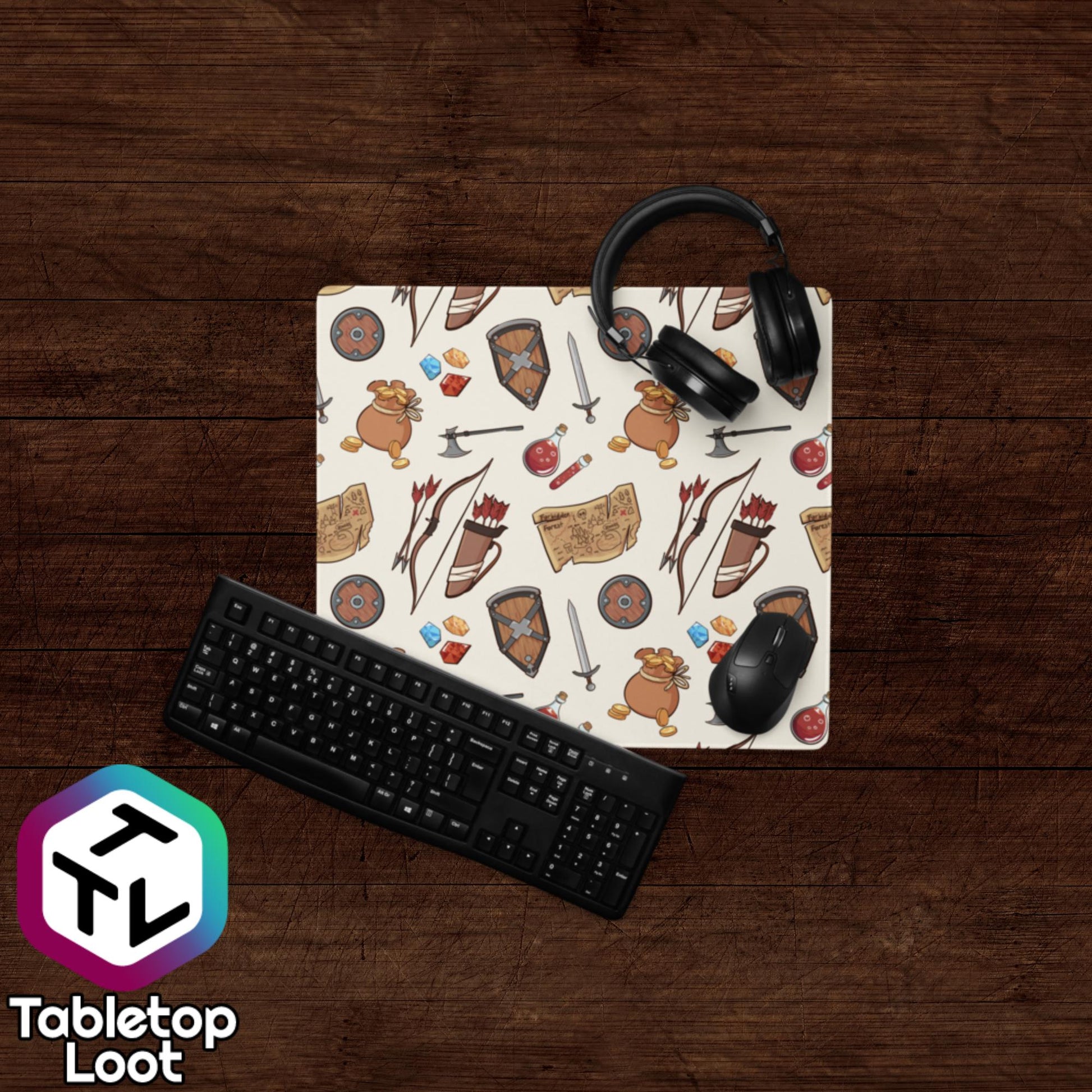 The Adventuring 18 inch by 16 inch size mouse pad from Tabletop Loot has a pattern of illustrated adventuring gear including gems, gold, shields, swords, bows, arrows, quivers, and maps.