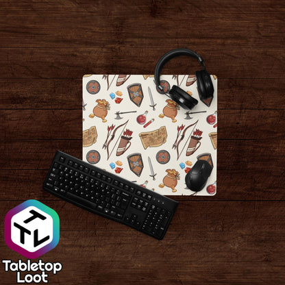 The Adventuring 18 inch by 16 inch size mouse pad from Tabletop Loot has a pattern of illustrated adventuring gear including gems, gold, shields, swords, bows, arrows, quivers, and maps.